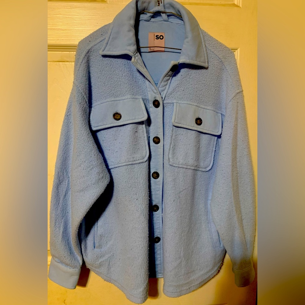 Light Baby Blue Button Up Jacket or Shirt. Has 2 Top Pockets. Fluffy looking.